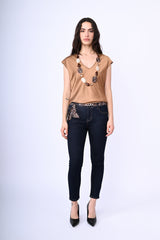 Jeans con fascia in vita animalier