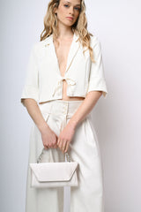 Blazer crop con nastrini da annodare