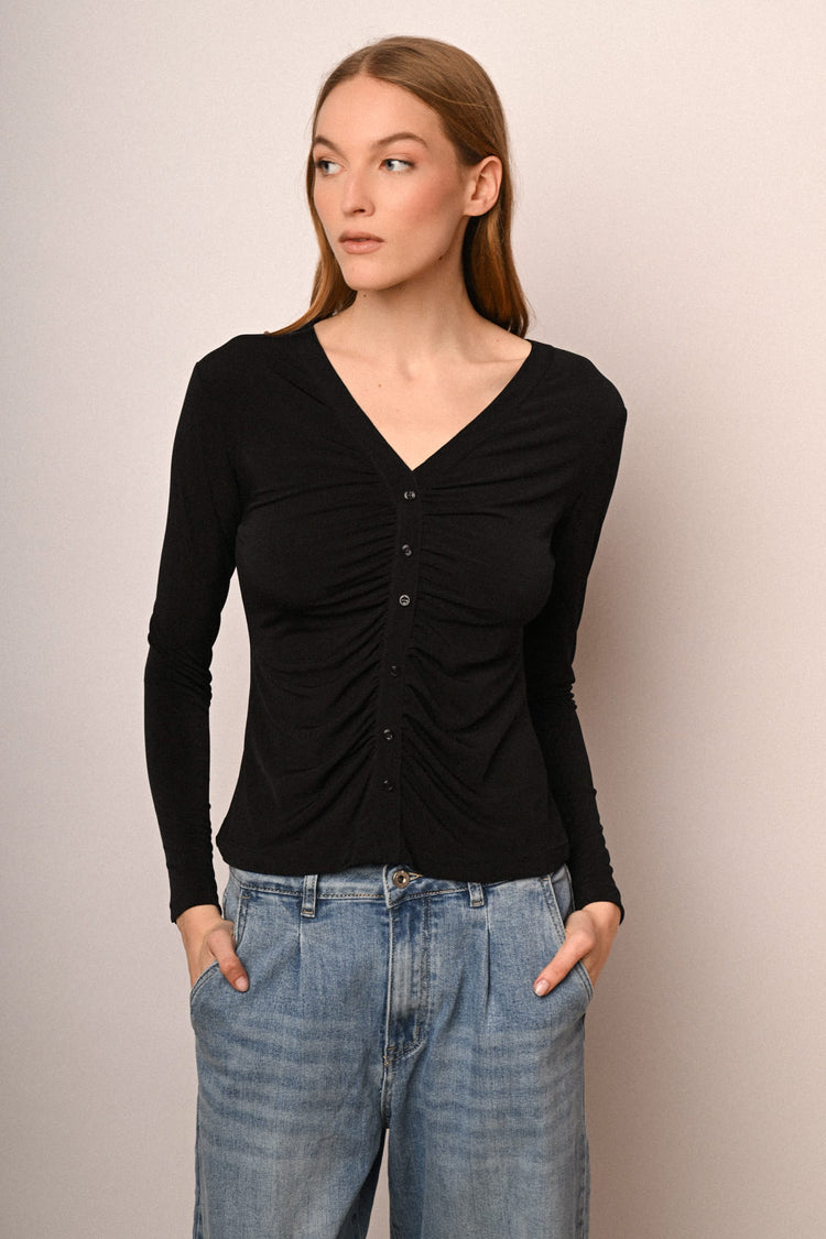 Top a maniche lunghe con bottoni