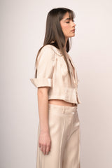 Blazer crop in raso avorio con laccetti