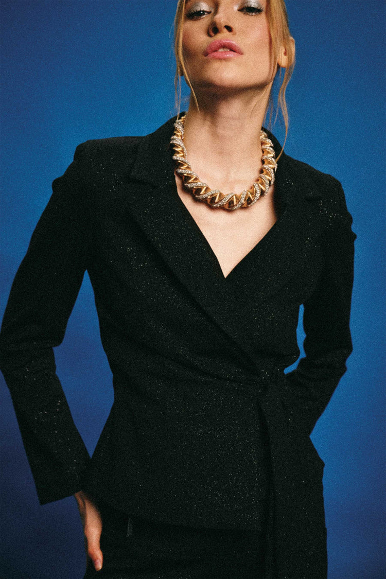 Blazer con glitter e fiocco