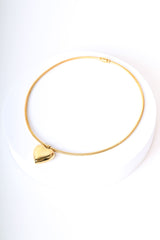 Collana rigida con pendente a cuore