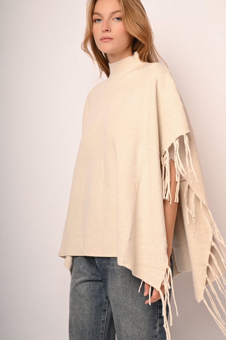 Poncho con frange