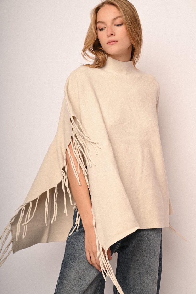 Poncho con frange