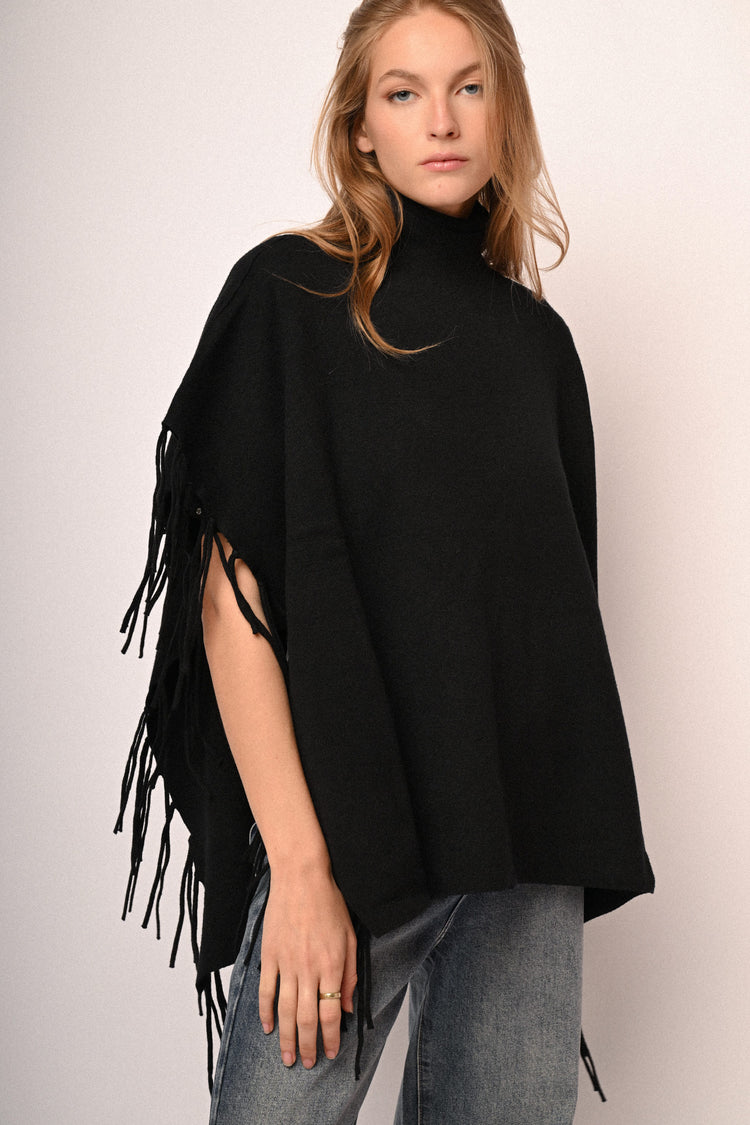 Poncho con frange