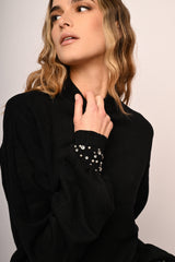Dolcevita con strass ai polsini