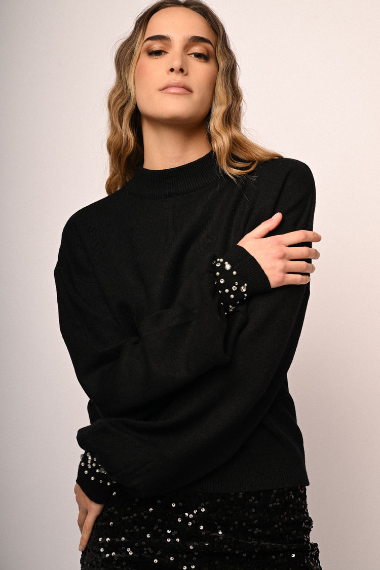 Dolcevita con strass ai polsini