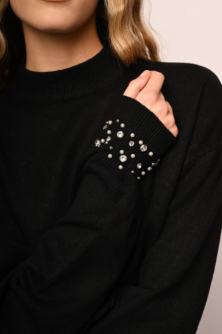Dolcevita con strass ai polsini