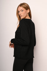 Pull con orlo a frange