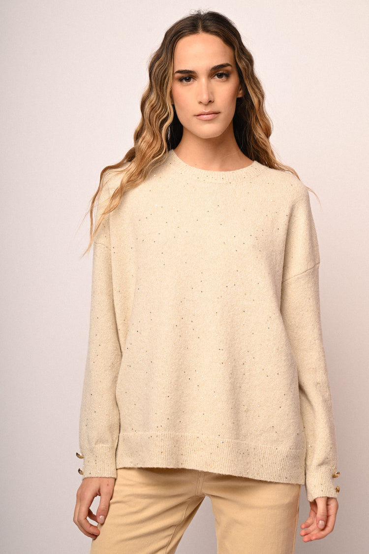 Pull con bottoni a cuore e strass