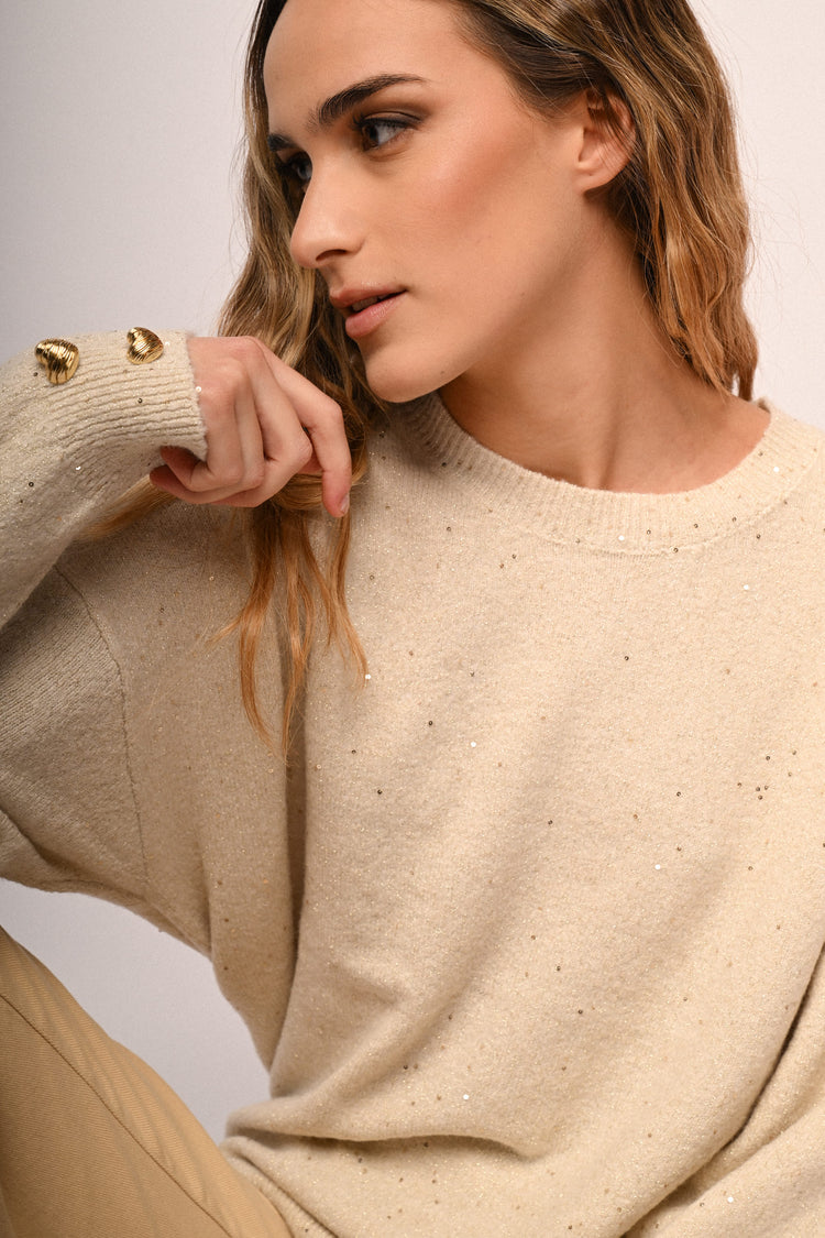 Pull con bottoni a cuore e strass