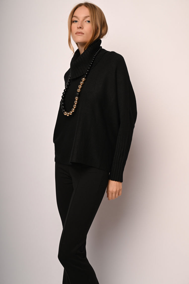 Dolcevita oversize con maniche a pipistrello