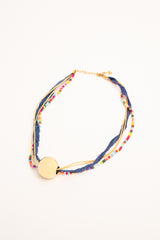 Collana con fili e sfera