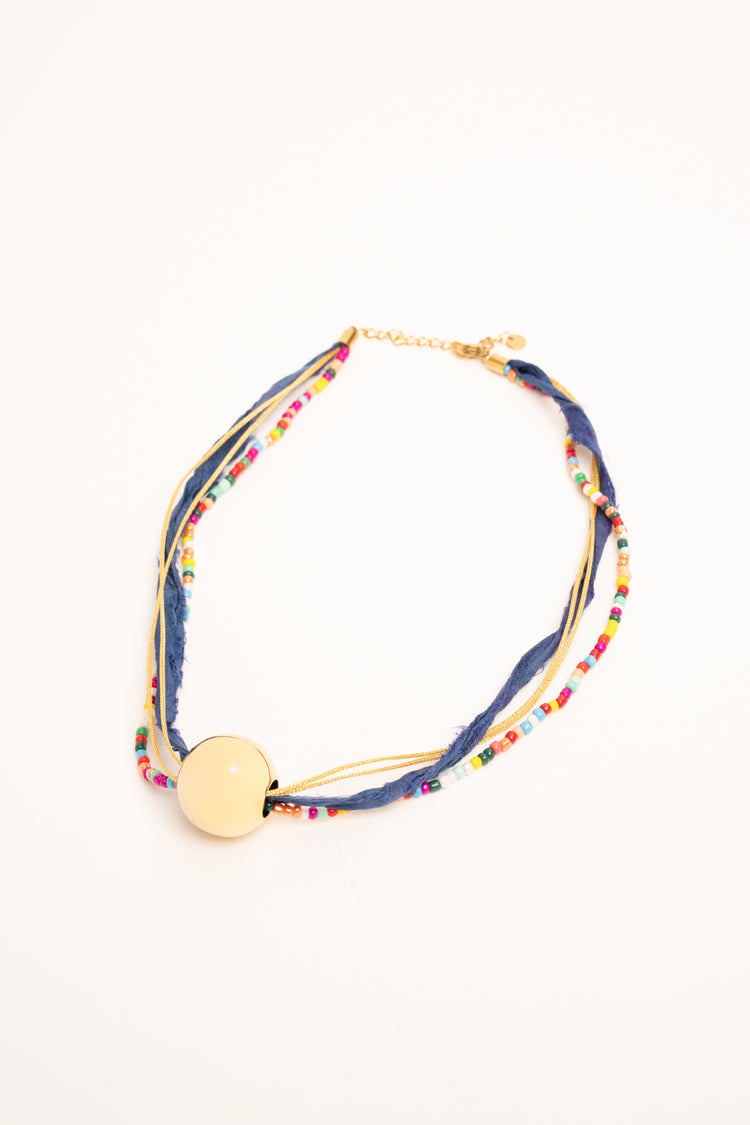 Collana con fili e sfera