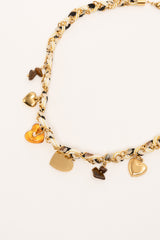 Collana con tessuto e pendenti