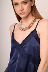 Top in raso con pizzo blu