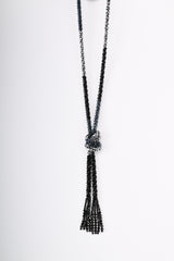 Collana lunga in perline con nodo