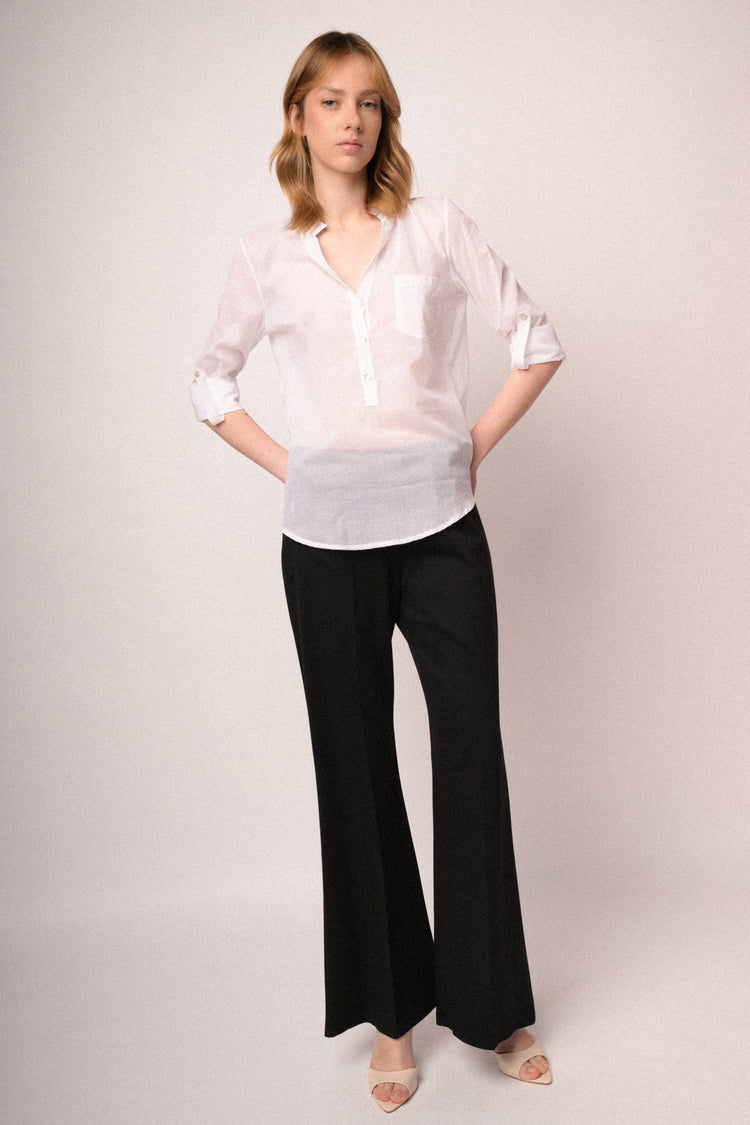 Blusa in cotone bianco con taschino