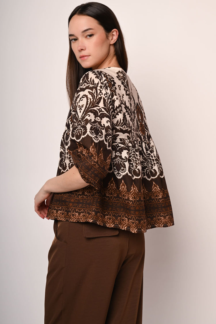 Blusa a stampa etnica con nastrini