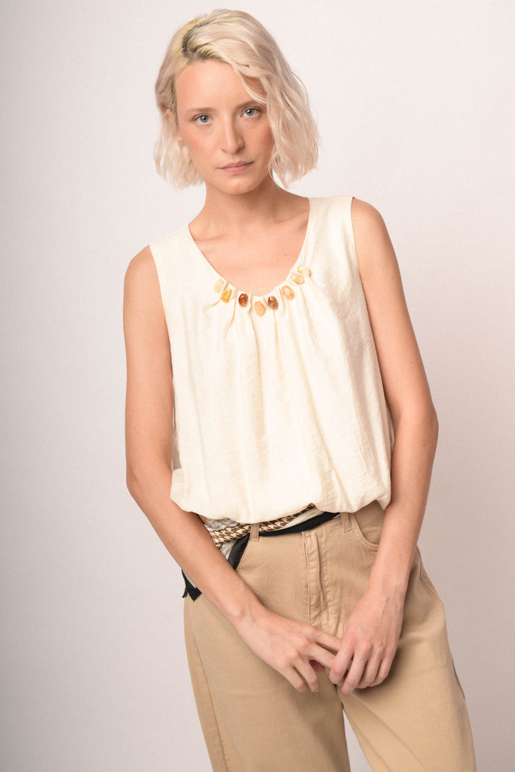 Top avorio con pietre decorative multicolor