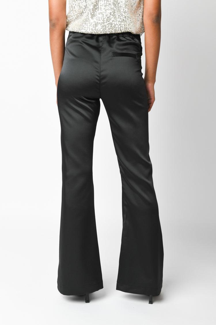 Pantaloni a zampa in raso