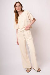 Joggers a gamba ampia misto modal avorio con coulisse in strass