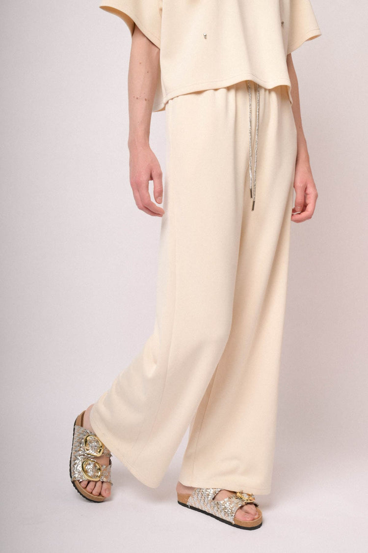 Joggers a gamba ampia misto modal avorio con coulisse in strass