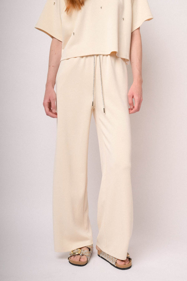 Joggers a gamba ampia misto modal avorio con coulisse in strass
