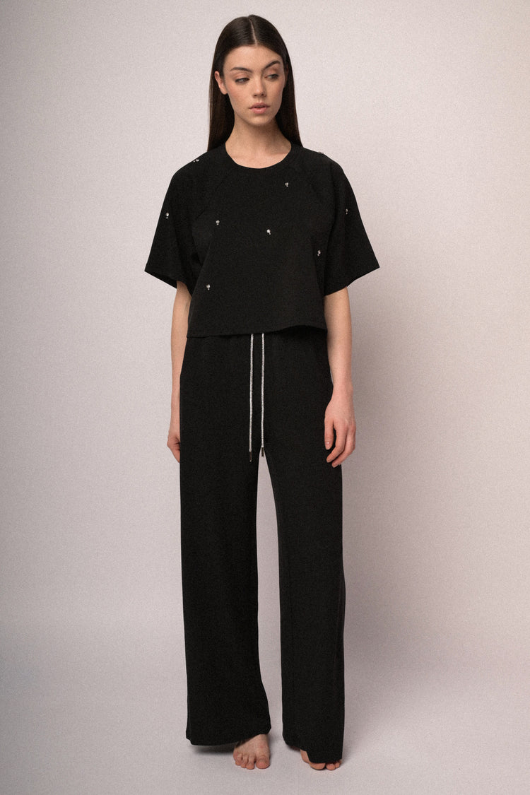 Pantaloni joggers con coulisse in strass