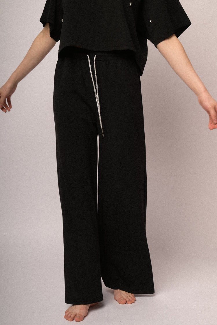 Pantaloni joggers con coulisse in strass
