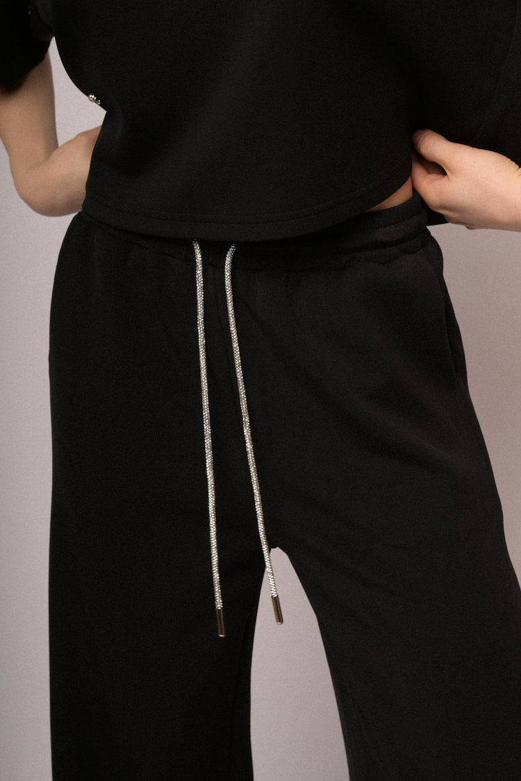 Pantaloni joggers con coulisse in strass