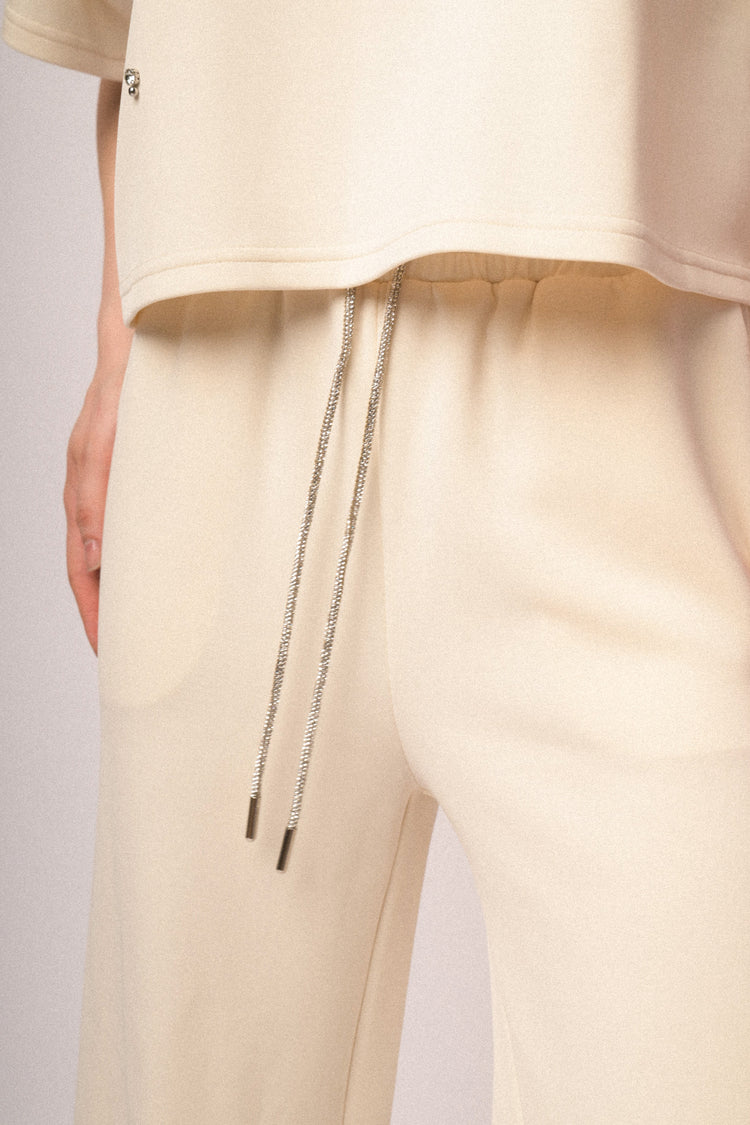 Pantaloni joggers con coulisse in strass