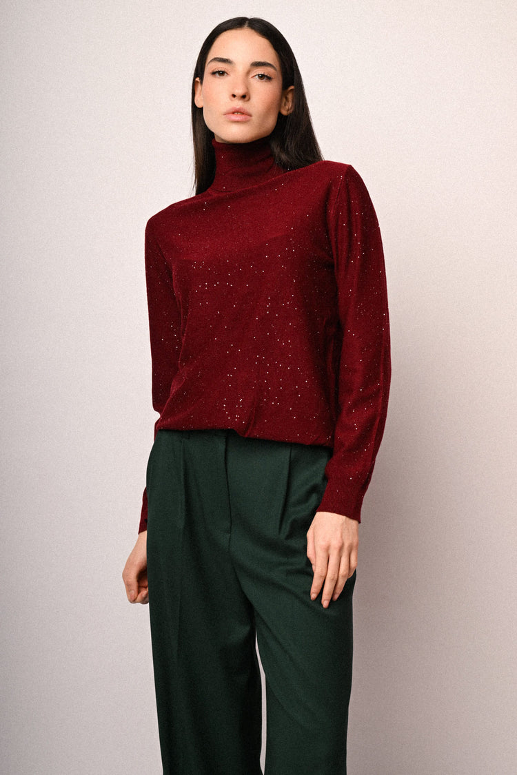 Dolcevita con mini paillettes all-over