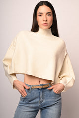 Pull a poncho con bottoni