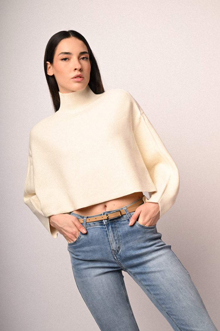 Pull a poncho con bottoni