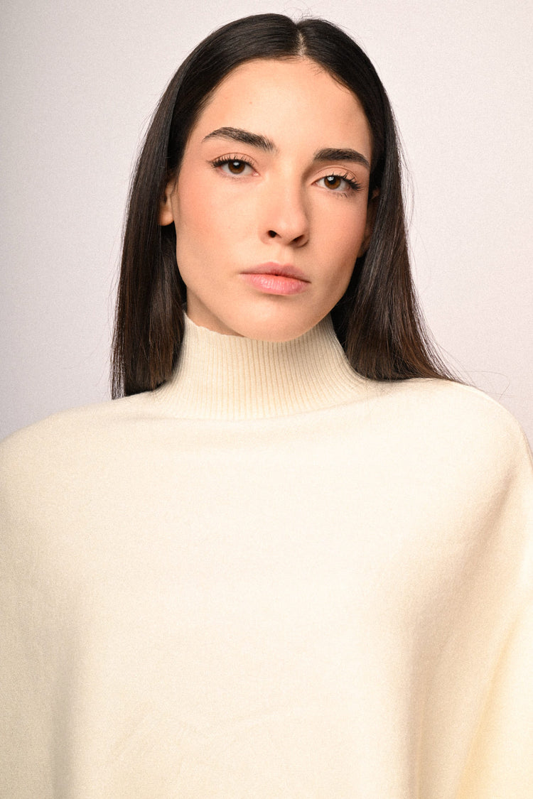 Pull a poncho con bottoni