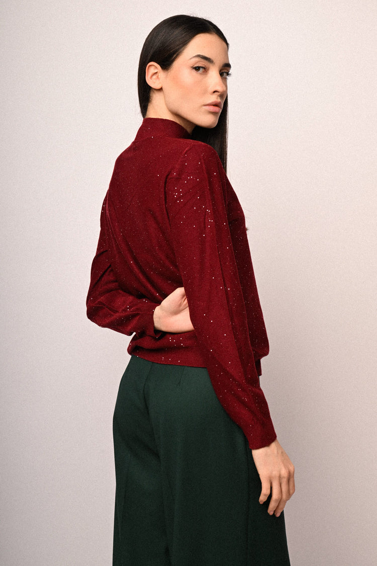 Lupetto con paillettes all-over