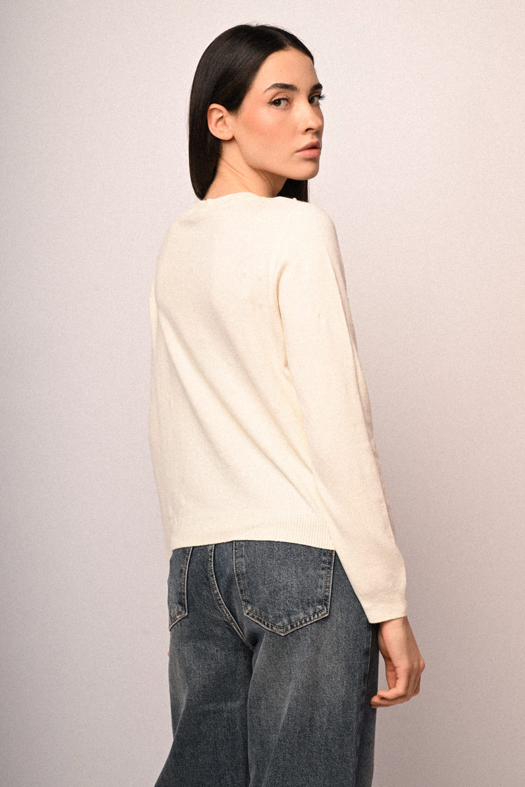 Pull con perle decorative