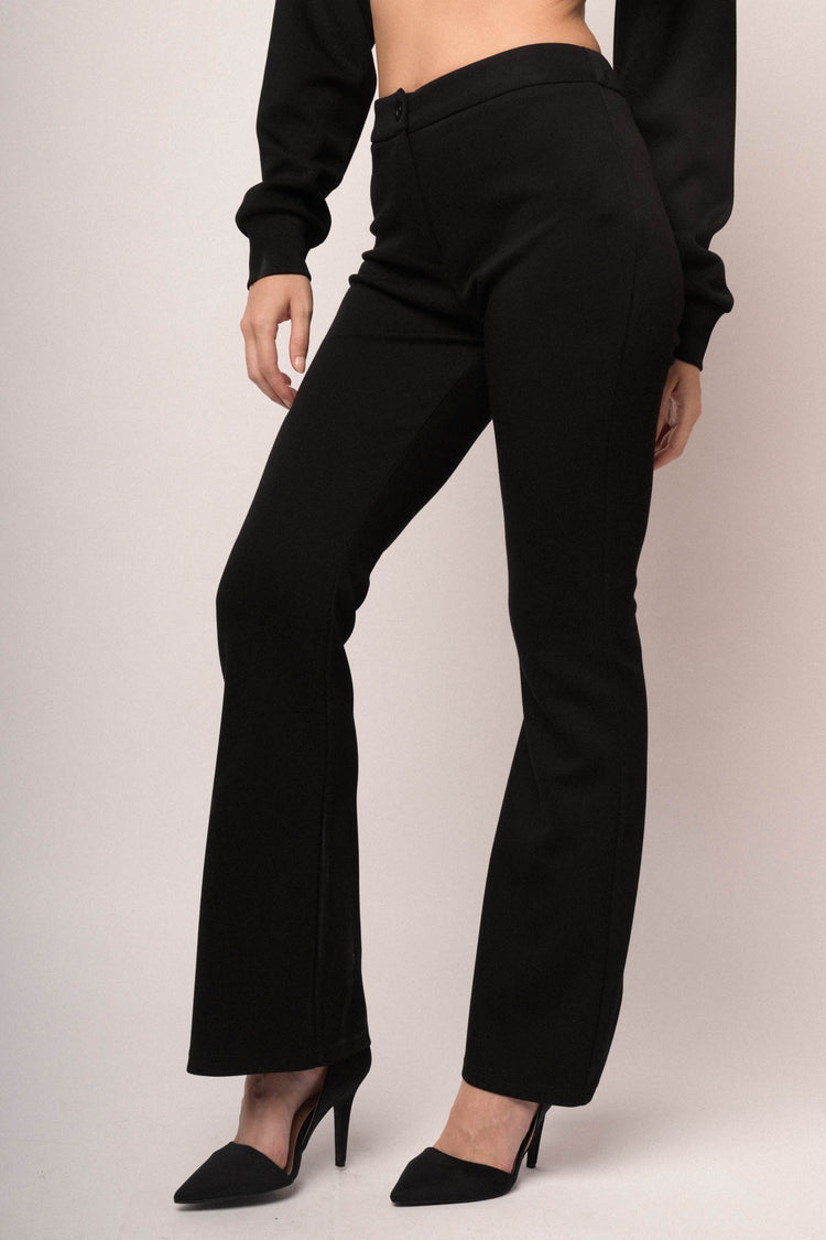 Pantaloni in jersey felpato nero a gamba svasata