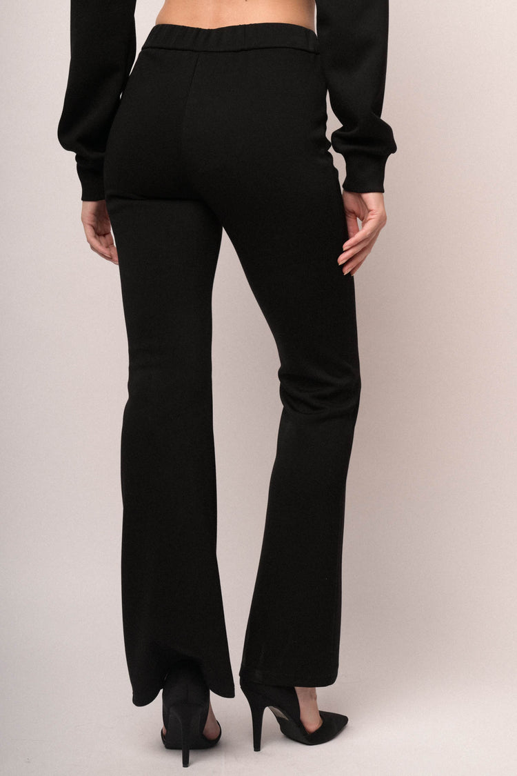 Pantaloni in jersey felpato nero a gamba svasata