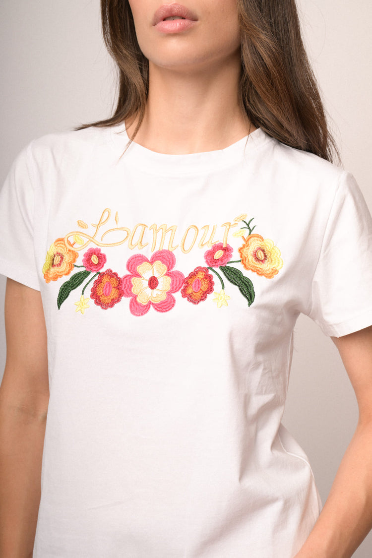 T-shirt in cotone bianco con ricamo Lamour