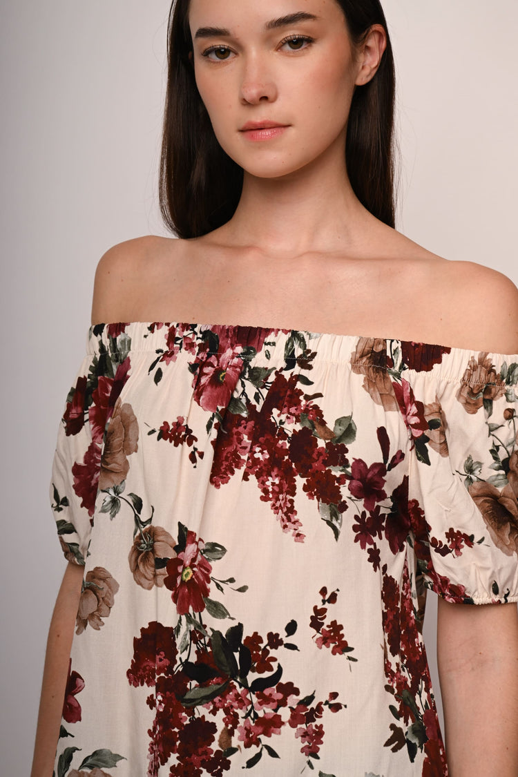 Top a stampa floreale con spalle scoperte