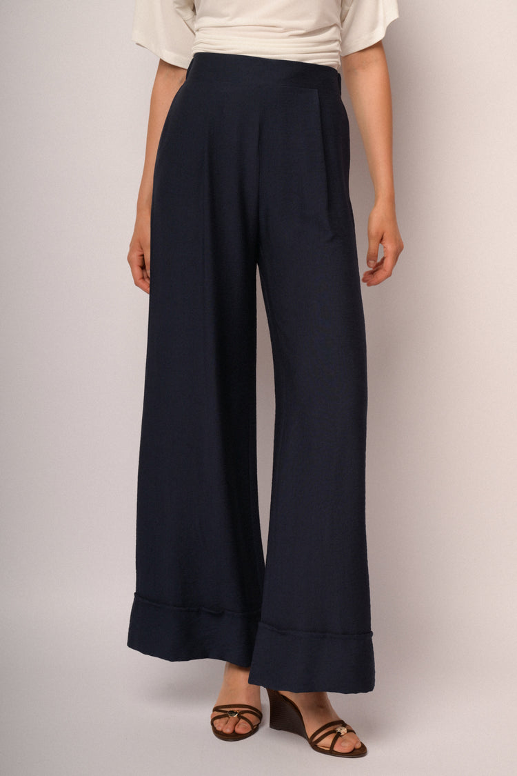 Pantaloni palazzo blu con risvolto