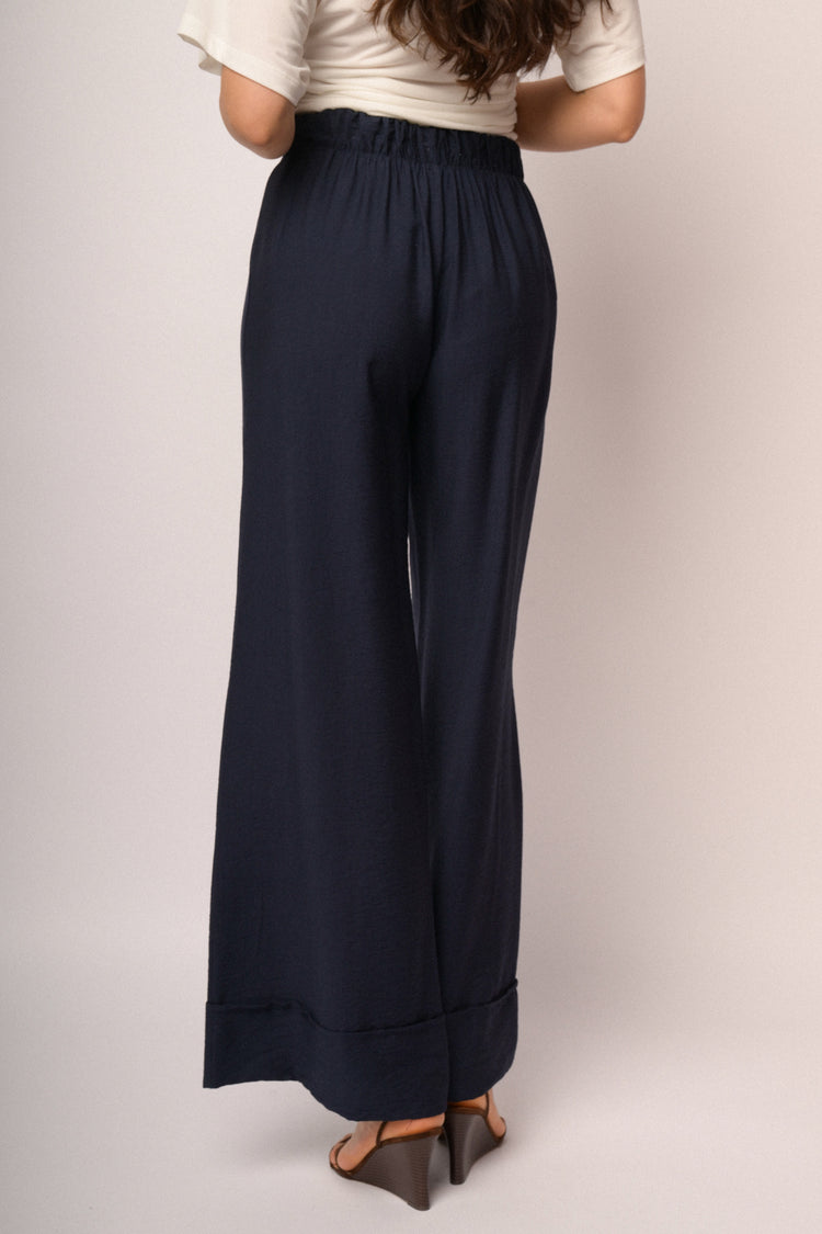 Pantaloni palazzo blu con risvolto