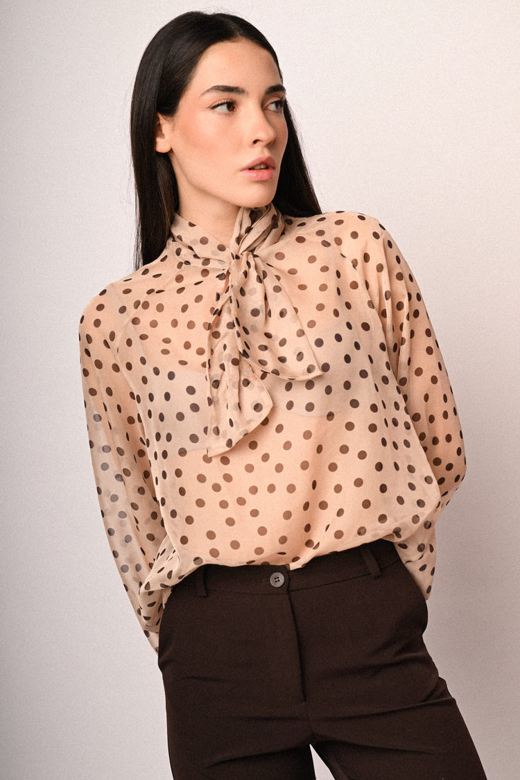 Blusa con fiocco e stampa a pois