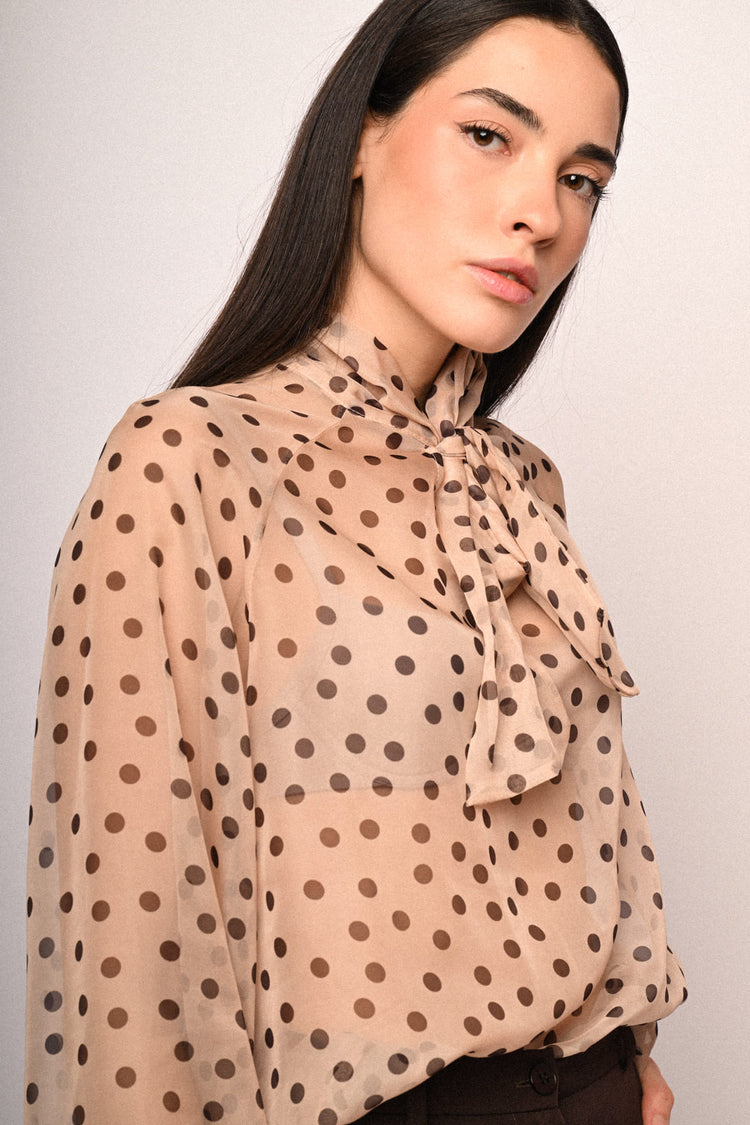 Blusa con fiocco e stampa a pois
