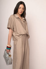 Pantaloni crop in viscosa stropicciata beige