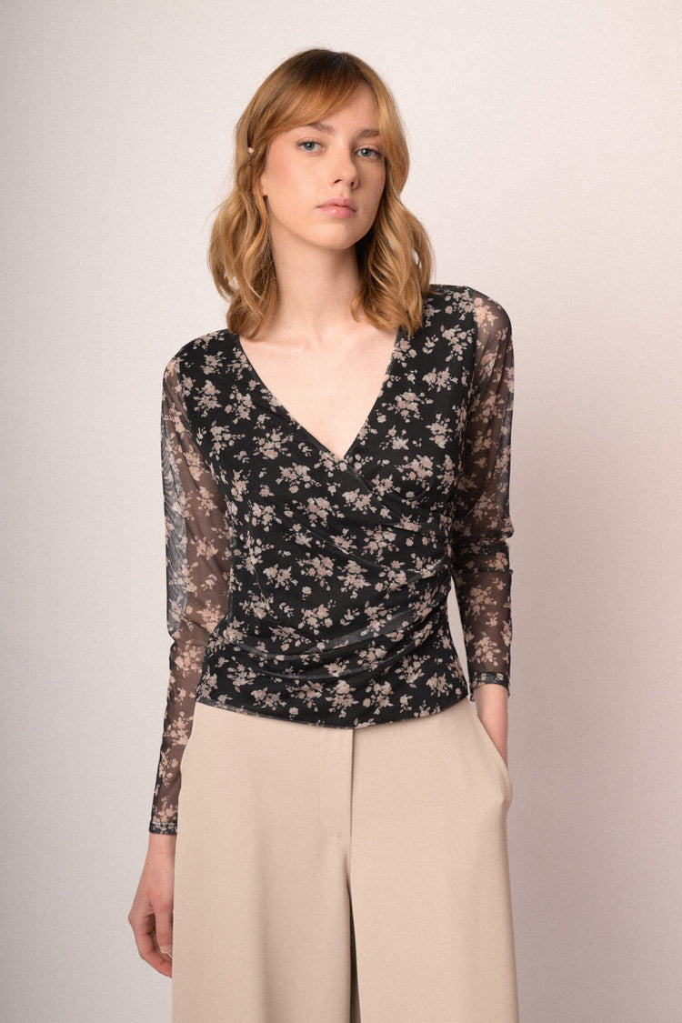 Top a maniche lunghe in tulle nero con stampa floreale