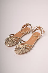Sandali flat nude con borchie oro