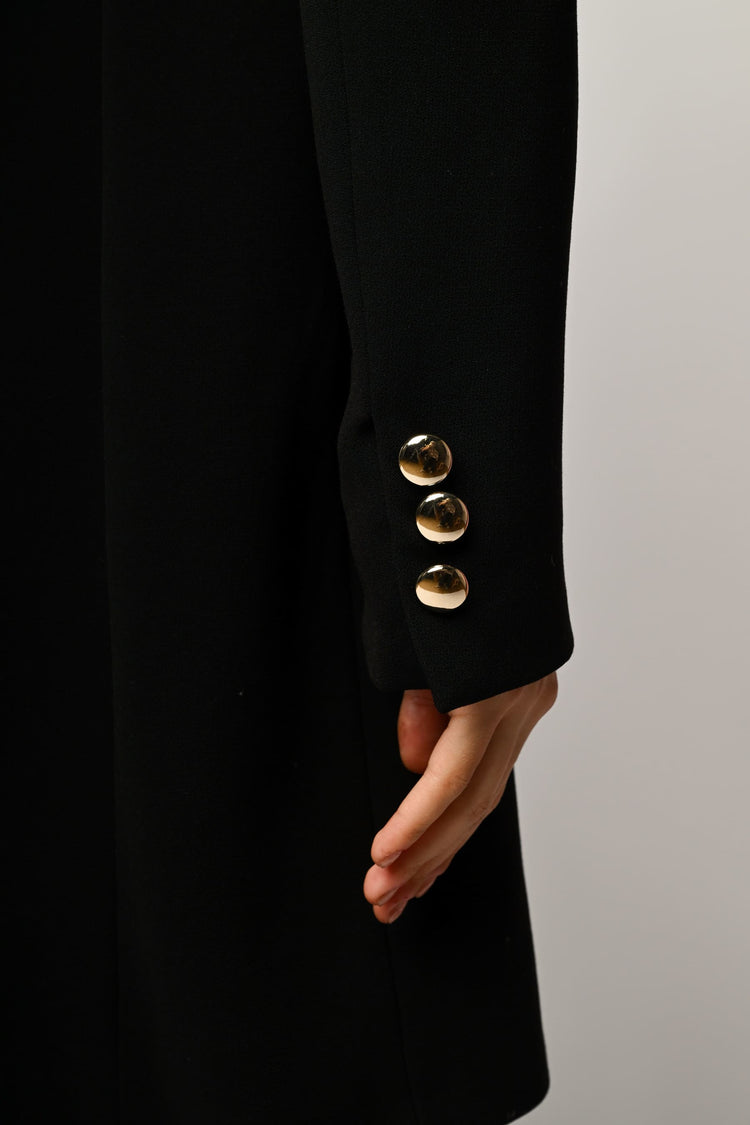 Cappotto con bottone gioiello